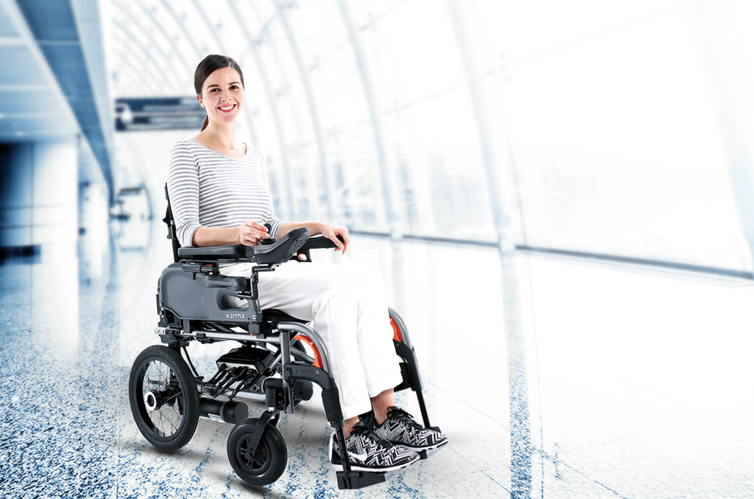  A-woman-in-an-outdoor-power-wheelchair-in-the-airport